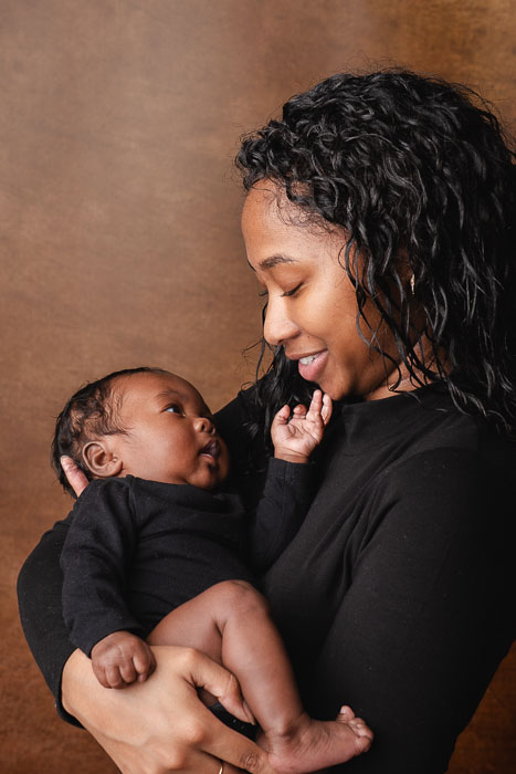 Baby fotoshoot, moeder met kind.